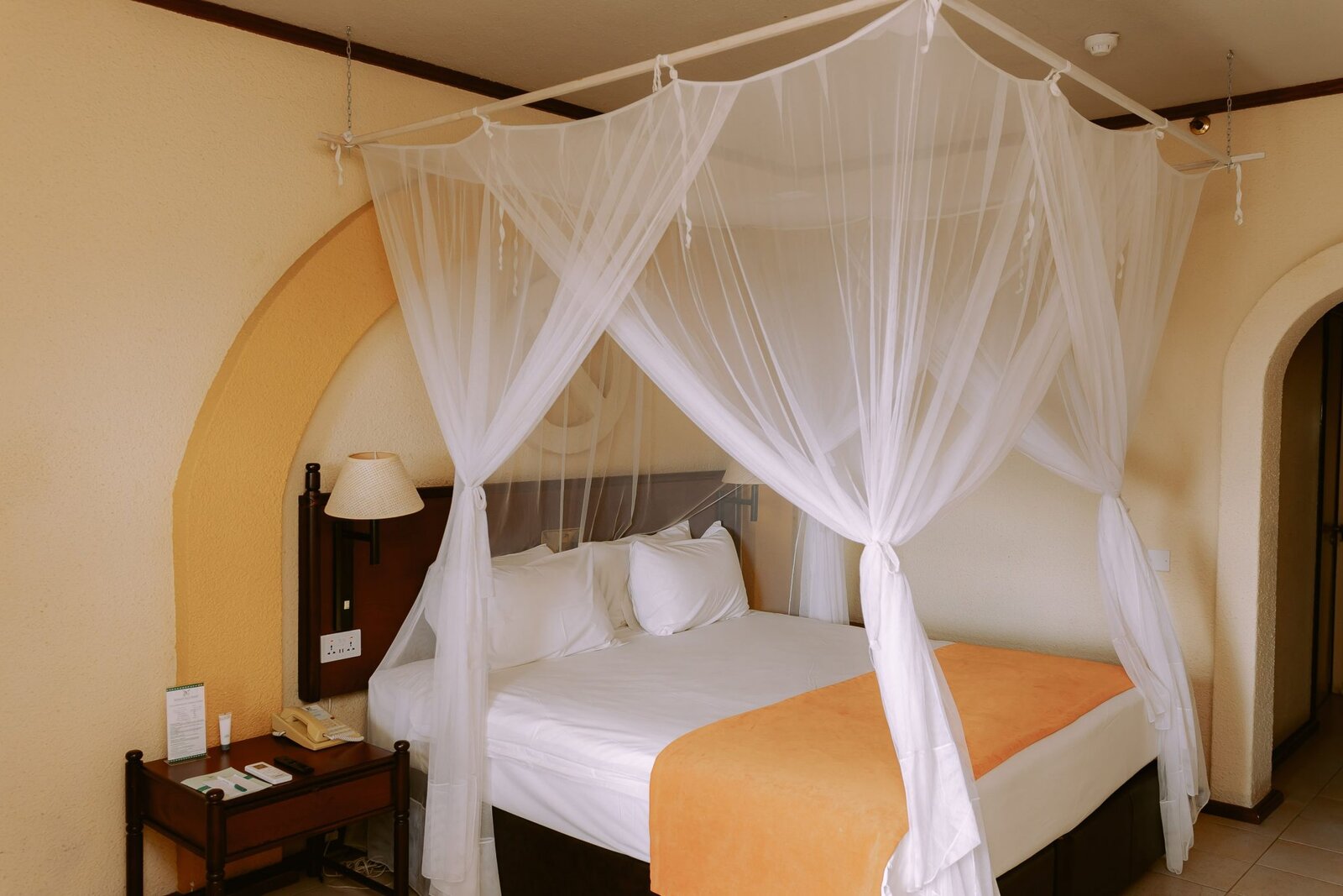 A guest room overlooking the golf course at Elephant Hills, Victoria Falls