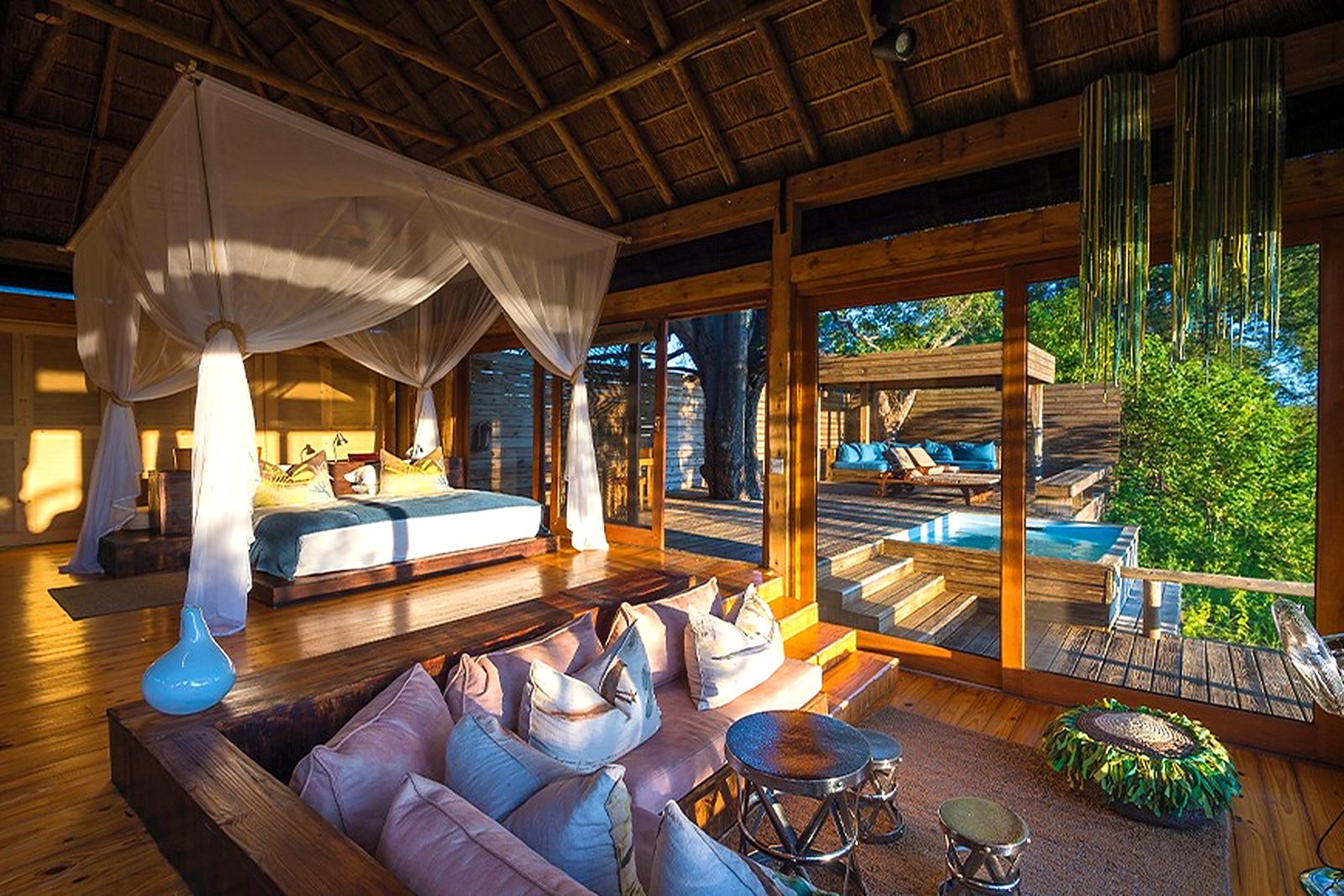 Open-fronted suite interior at Vumbura Plains