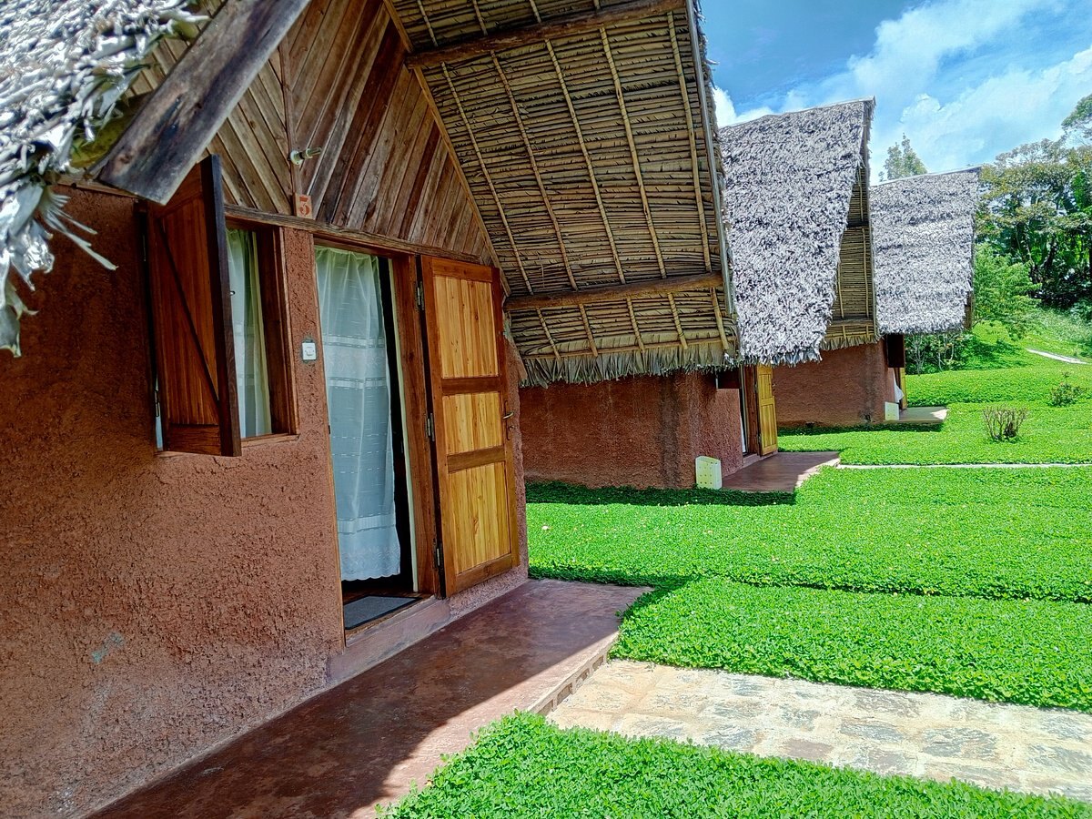 Thatched bungalow exterior at Andasibe Hotel, Andasibe rainforest