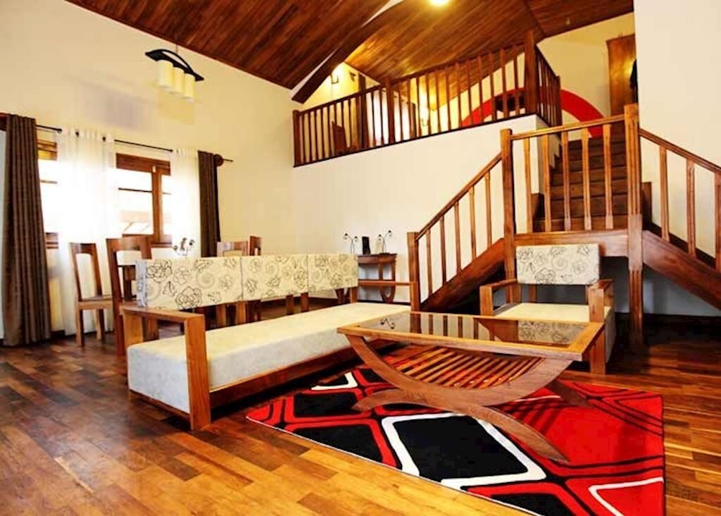 Timber bungalow suite interior at Andasibe Hotel, Andasibe