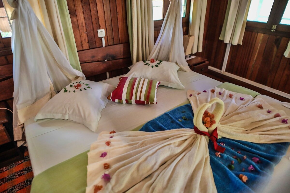 Decorated four-poster room at Olympe du Bemaraha near Tsingy de Bemaraha