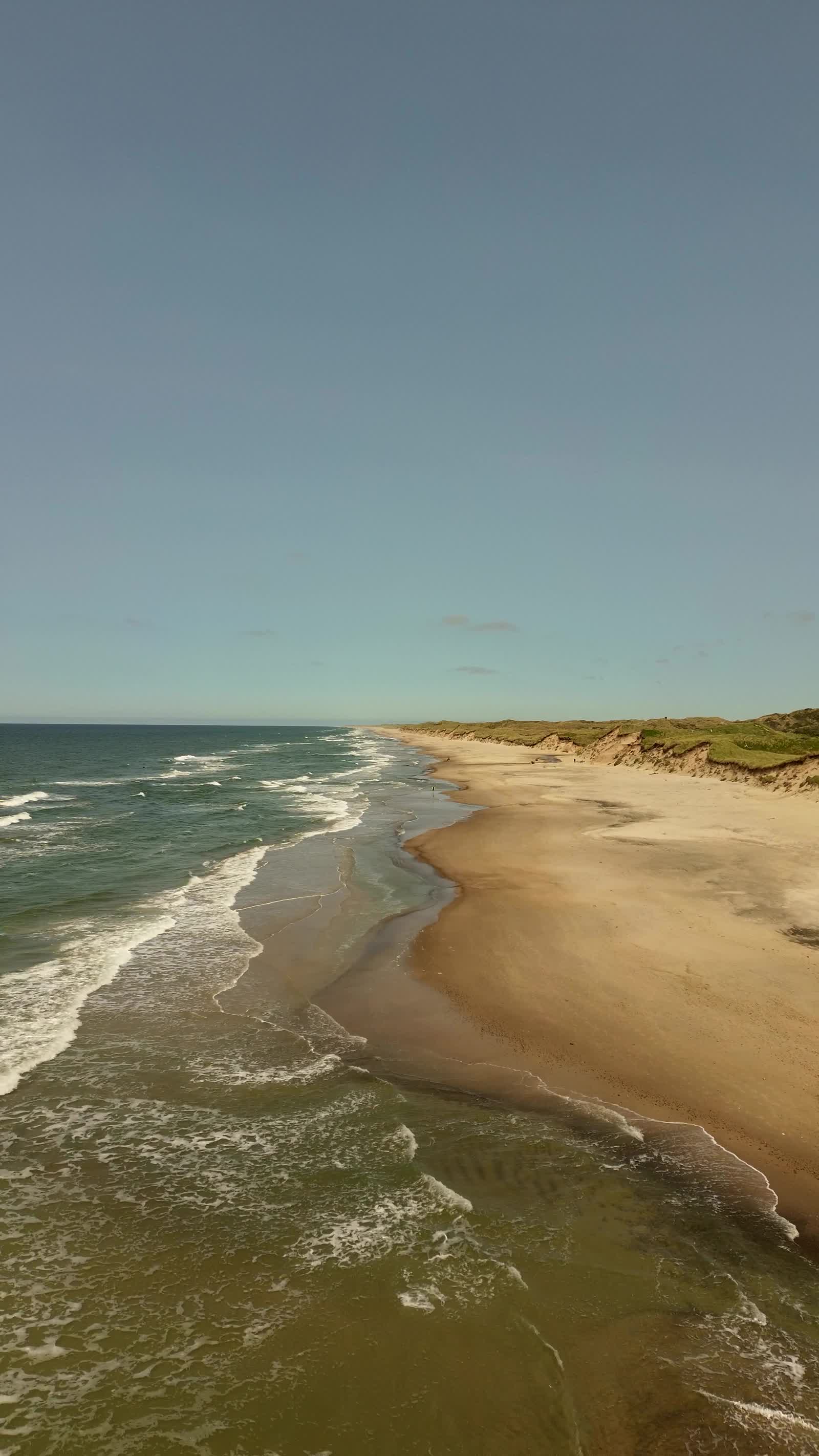 Dunes tumbling into the Atlantic