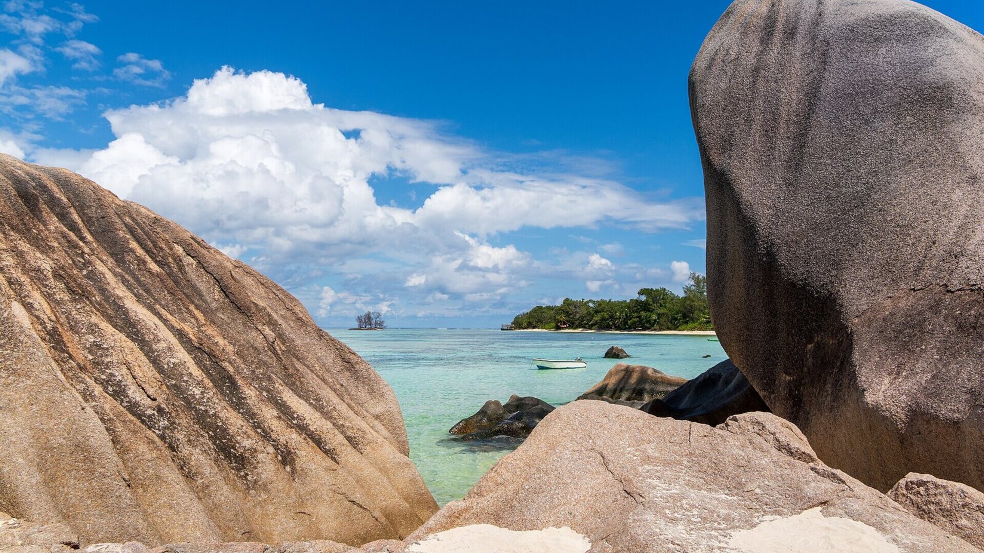 Granite boulders and turquoise water on a beach in Seychelles, one of the best beaches in Africa