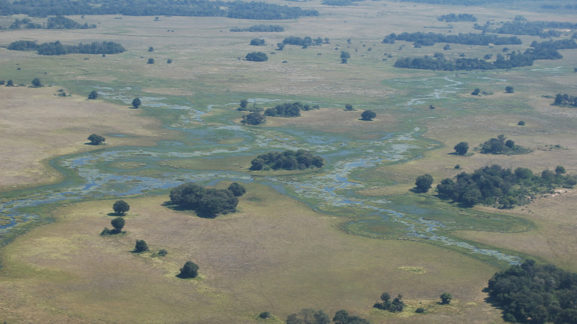 Aerial view of the Okavango Delta channels and floodplain islands — Botswana safari packages 2026