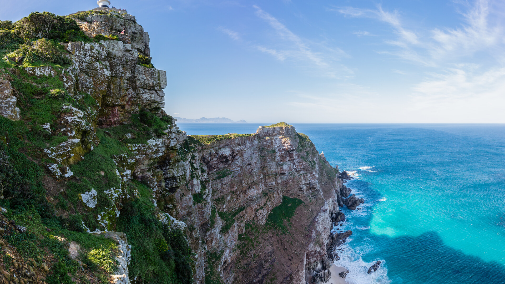 The dramatic cliffs of Cape Point plunging into the turquoise Atlantic within the Cape of Good Hope section of Table Mountain National Park