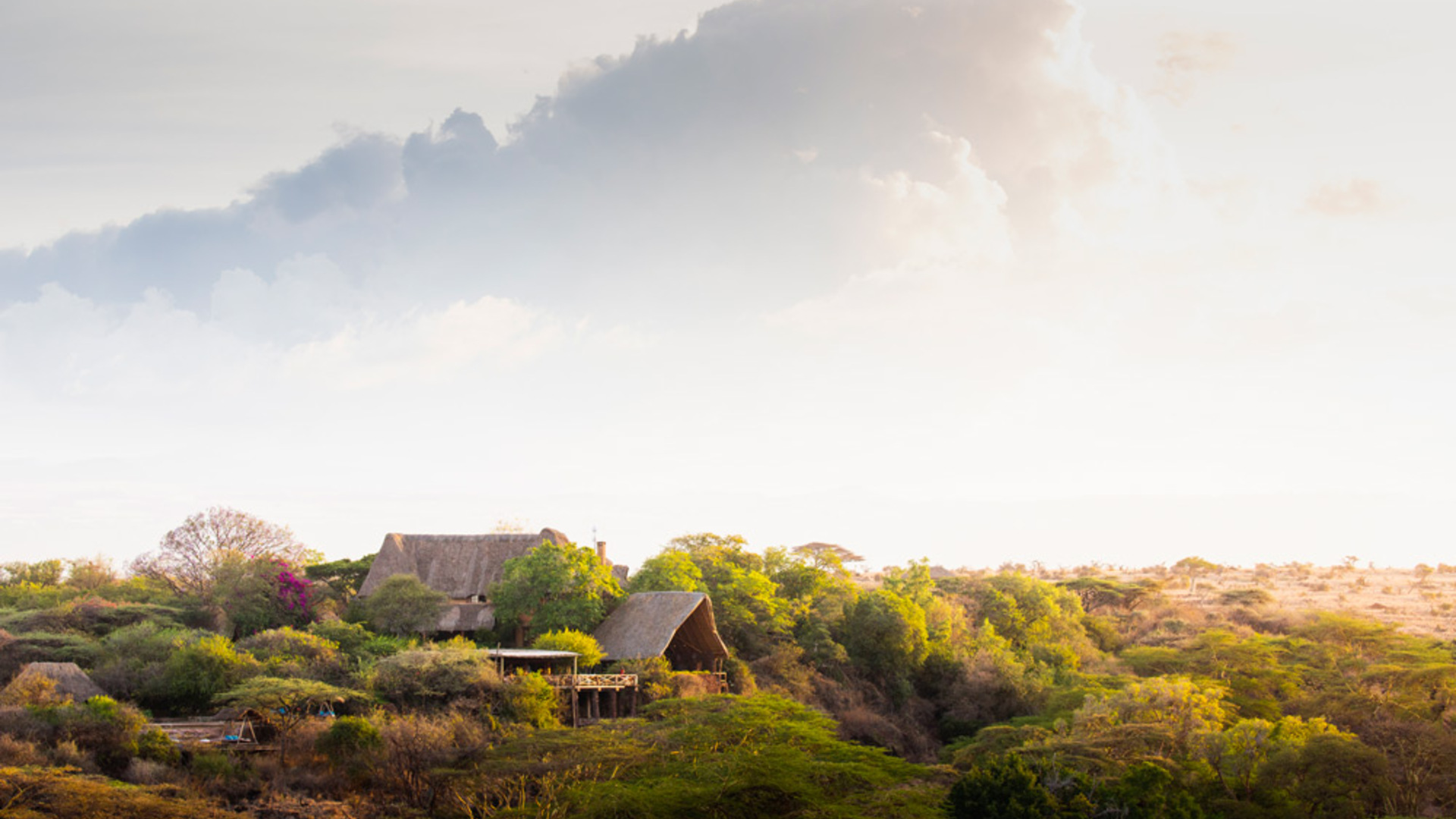 Lewa Wilderness Lodge cottage and gardens overlooking the Marania Valley — Craig family safari lodge Laikipia Kenya