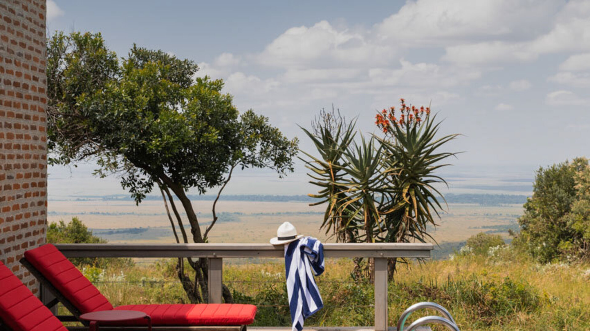 Rim-flow pool on the edge of the Great Rift escarpment overlooking the Masai Mara plains