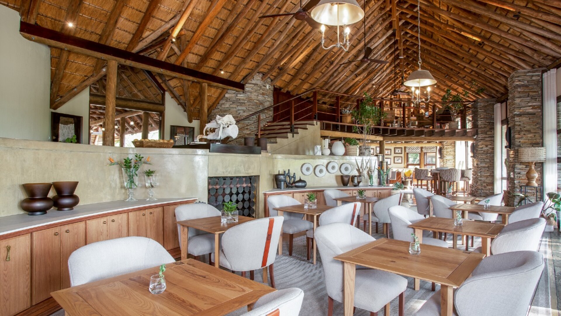 The contemporary main lodge and deck at Makanyi Private Game Lodge on a ridge in the Timbavati