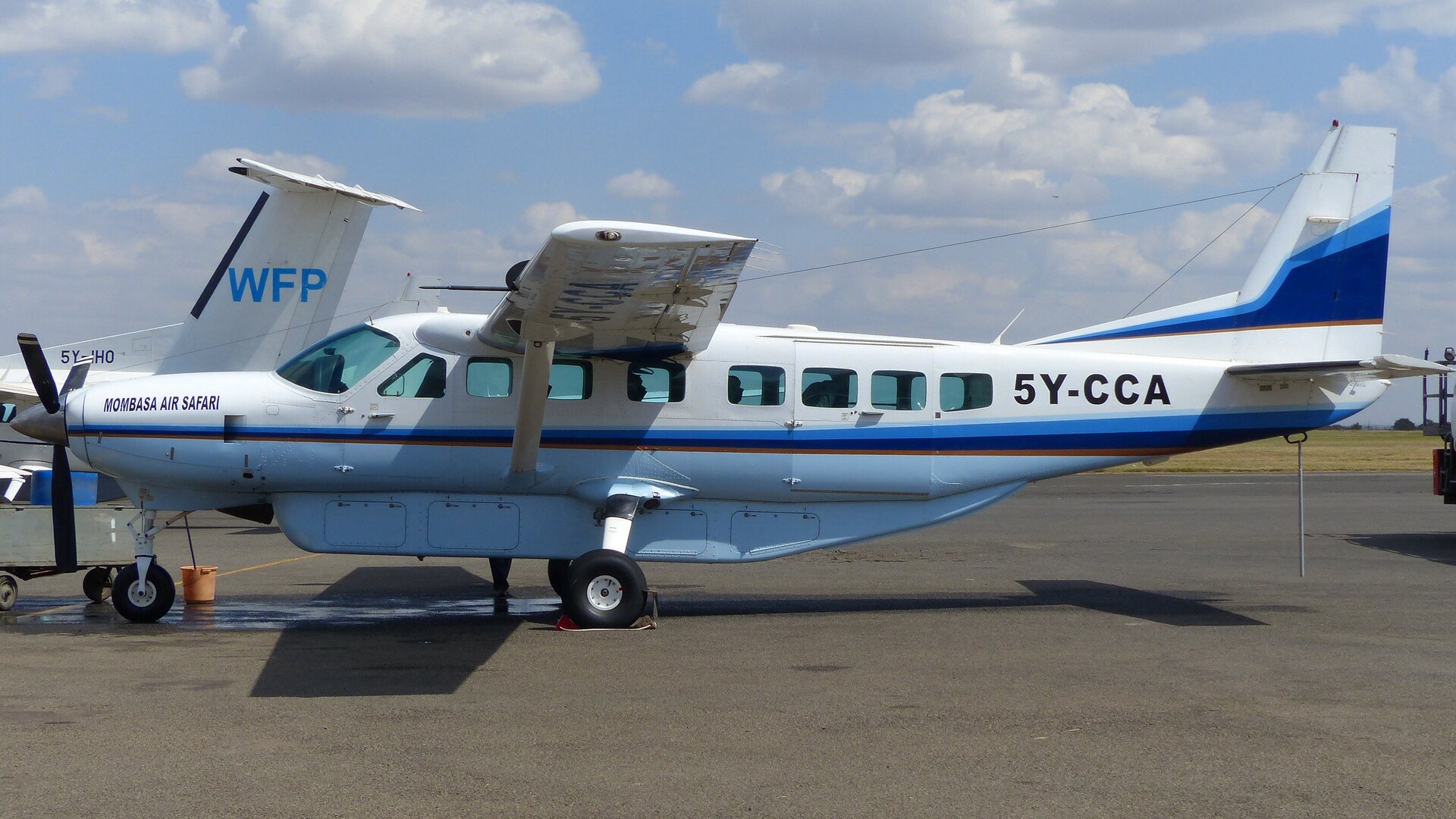Safari aircraft on a remote bush airstrip in Africa — the gateway to a fly-in private jet safari
