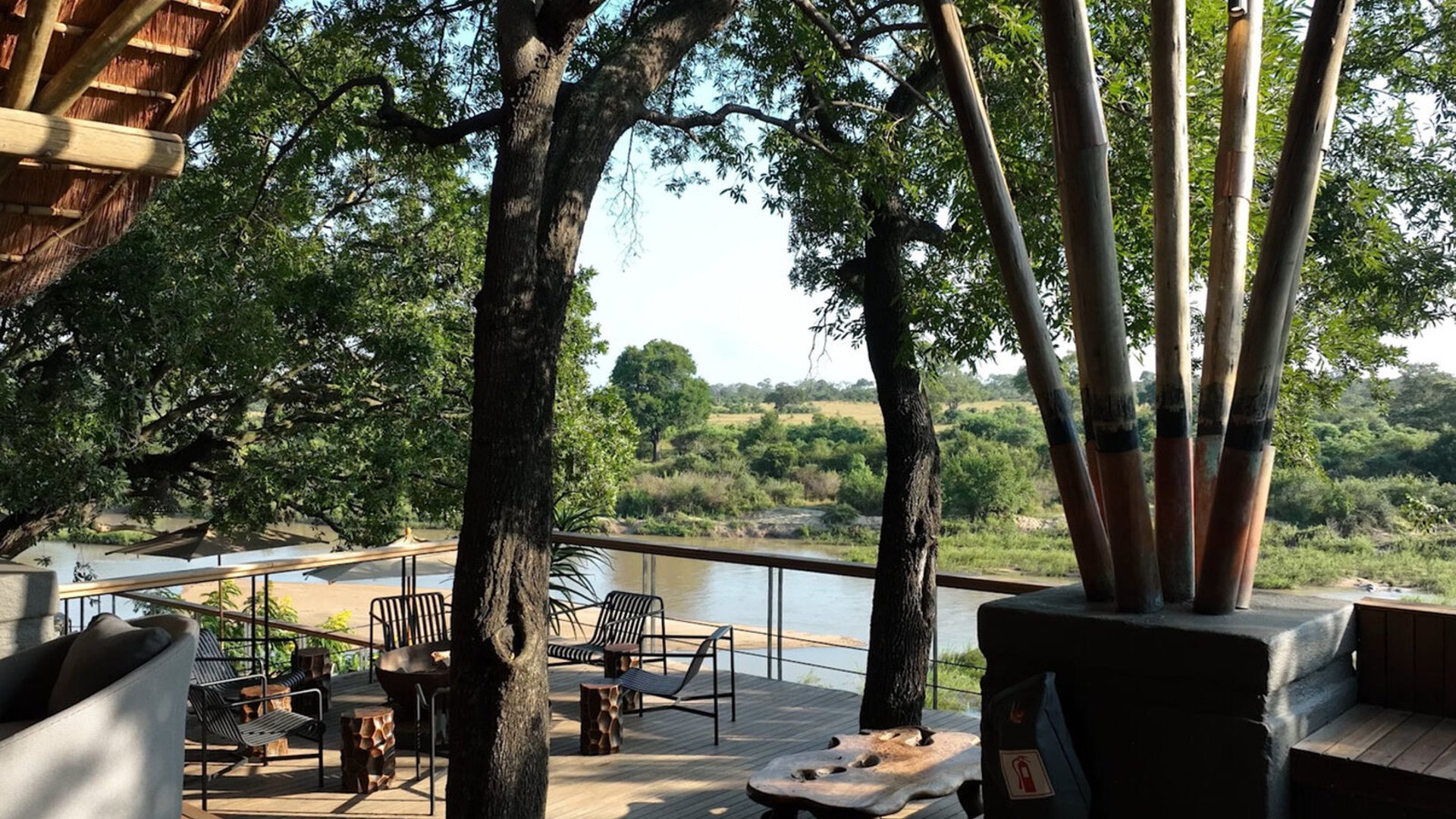 Luxury safari lodge deck at golden hour in the Sabi Sands private reserve — Sabi Sands luxury safari packages 2026