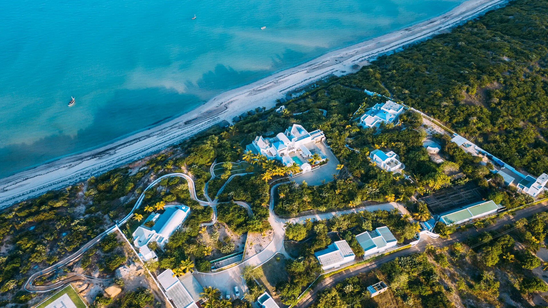 The whitewashed, blue-domed villas of Santorini Mozambique on the cliffs above Vilanculos Bay, gateway to the Bazaruto Archipelago