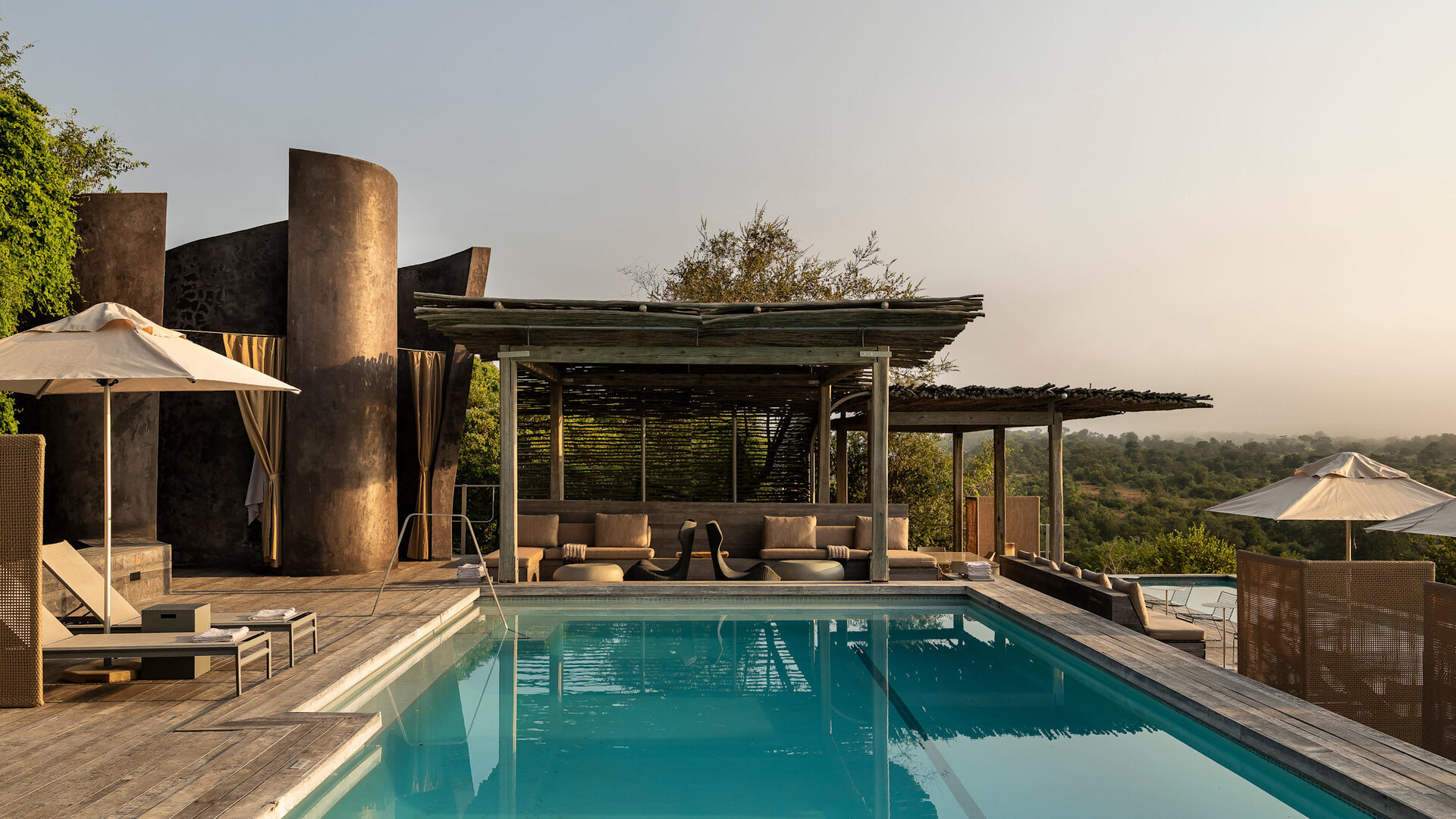 Singita Lebombo Lodge pool and contemporary glass-and-timber architecture overlooking the N'wanetsi River in eastern Kruger
