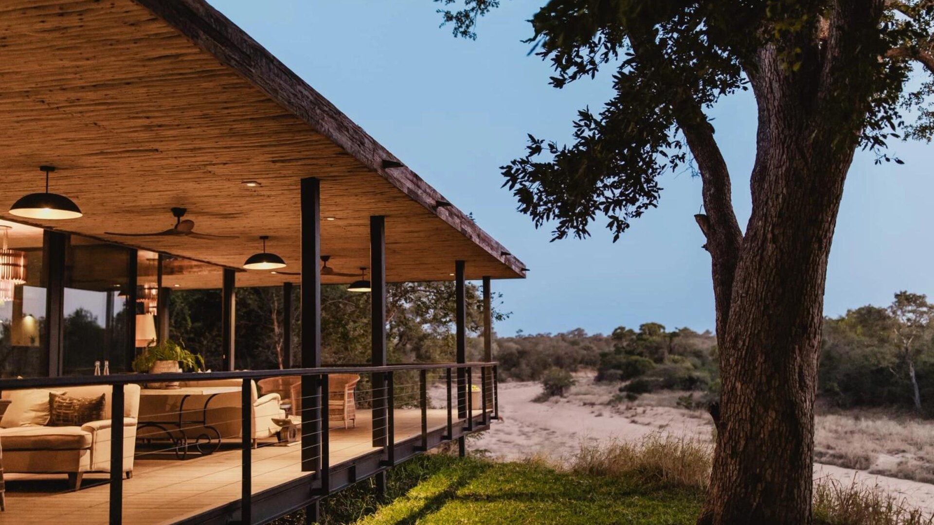 The raised timber deck and lounge at Tanda Tula Safari Camp looking out over the Timbavati bushveld
