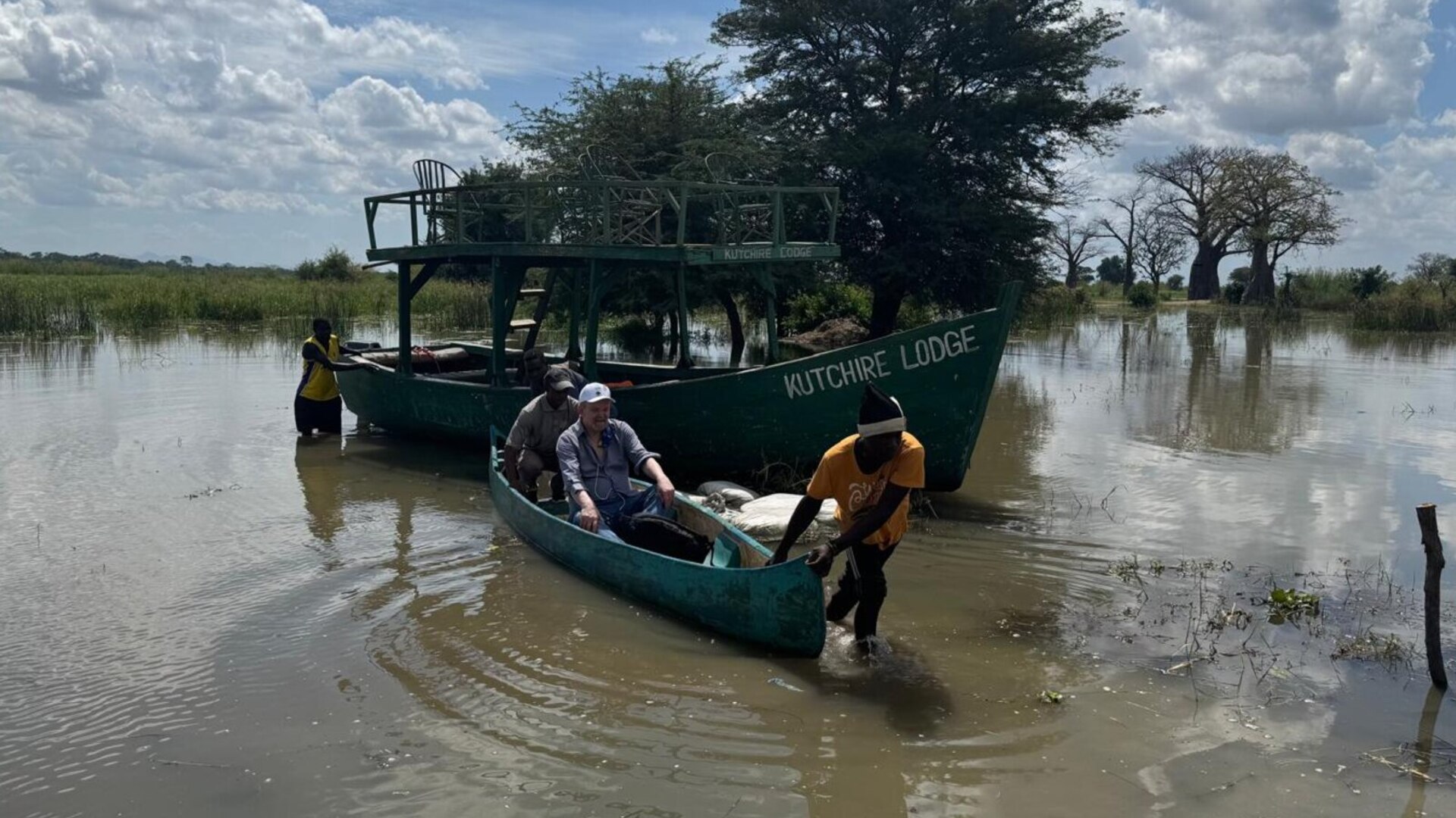 Boat safari gliding along the Shire River past elephants in Liwonde National Park, Malawi