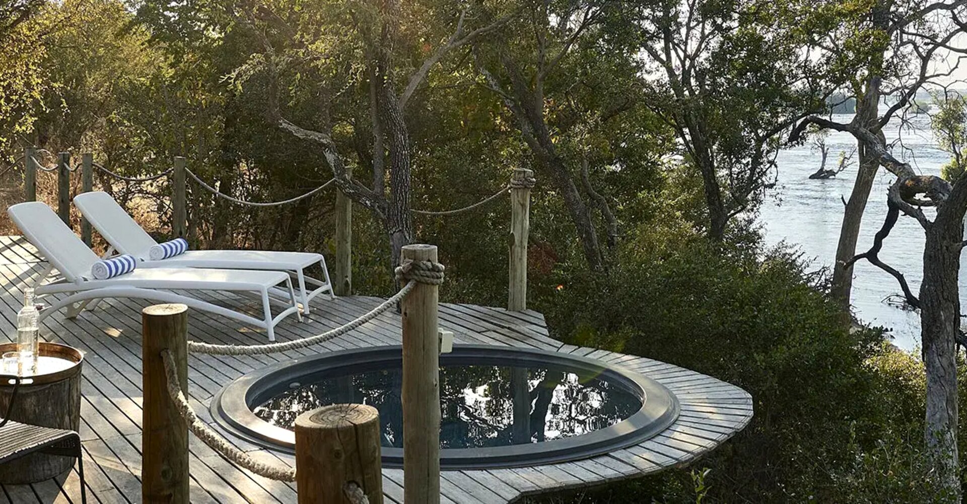 Riverfront tented suite deck overlooking the Zambezi at Victoria Falls River Lodge
