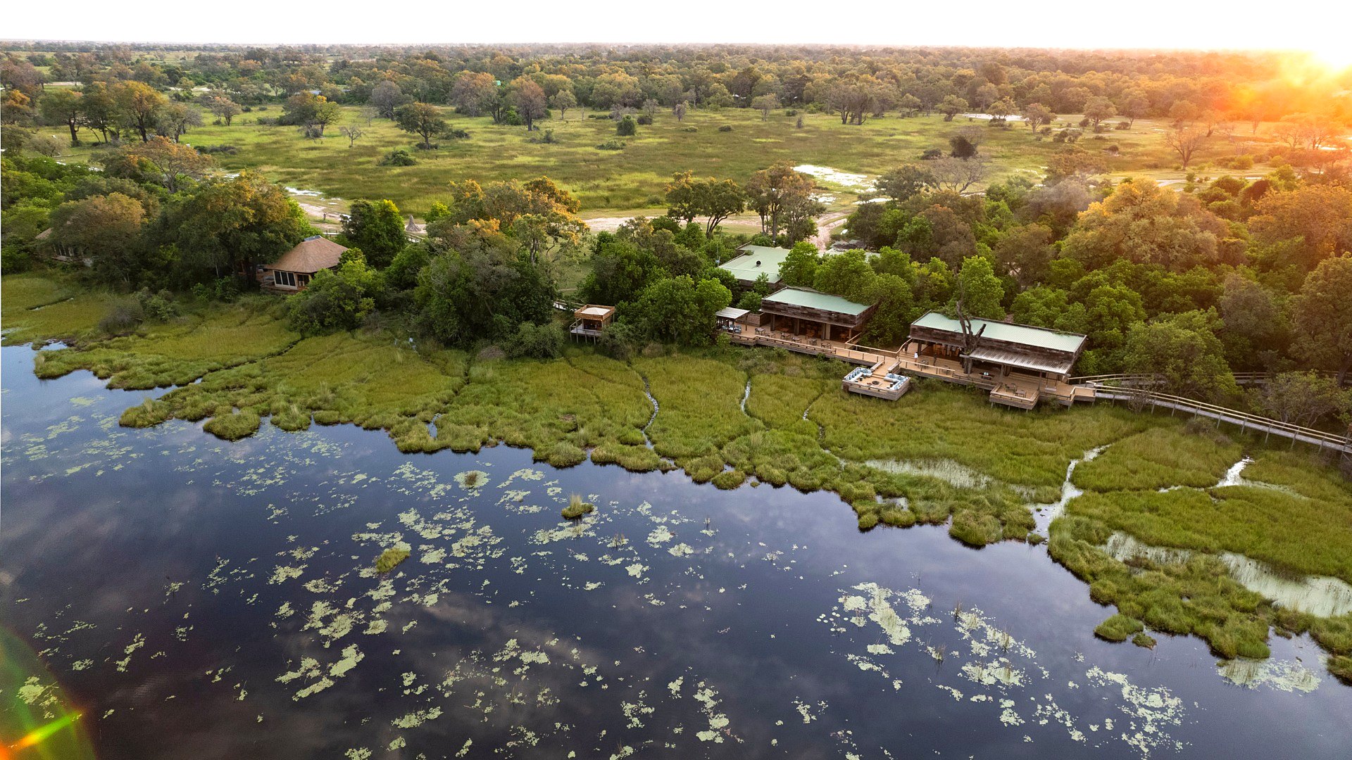 A raised contemporary suite at Vumbura Plains overlooking the northern Okavango floodplain