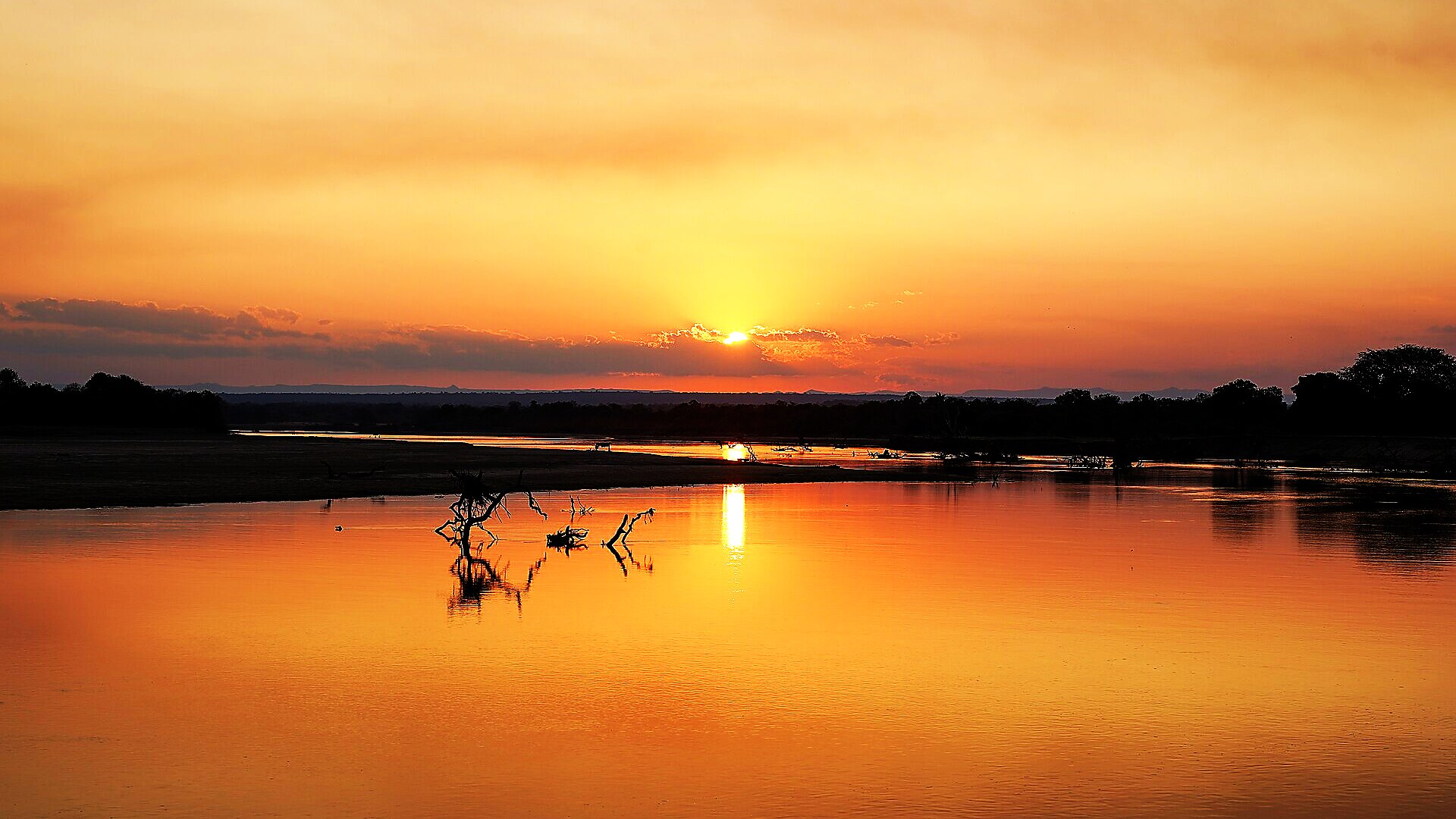 Sunset over the Luangwa River, South Luangwa National Park, Zambia — the birthplace of the walking safari and Africa's leopard capital — Top 10 Best Zambia safari packages 2026 and 2027