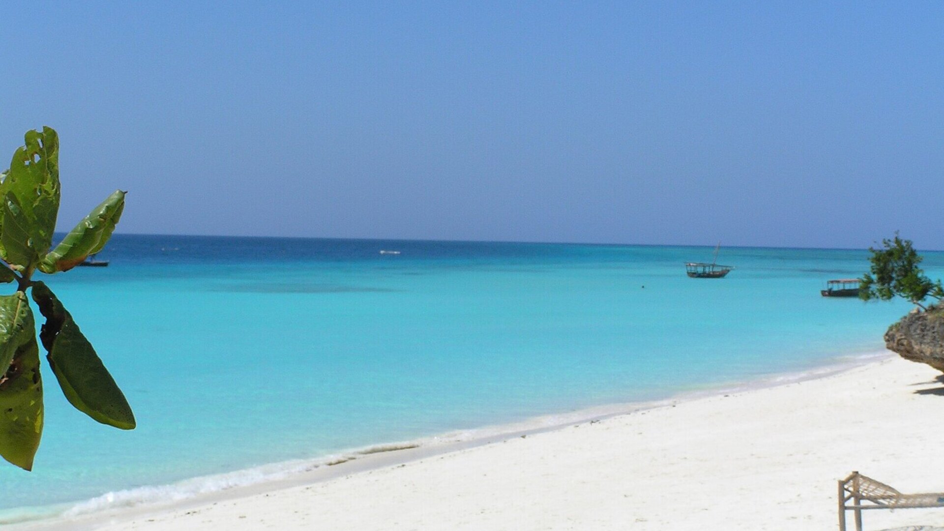 Turquoise waters and white sand beach at Nungwi, Zanzibar — the perfect finish to a Tanzania safari