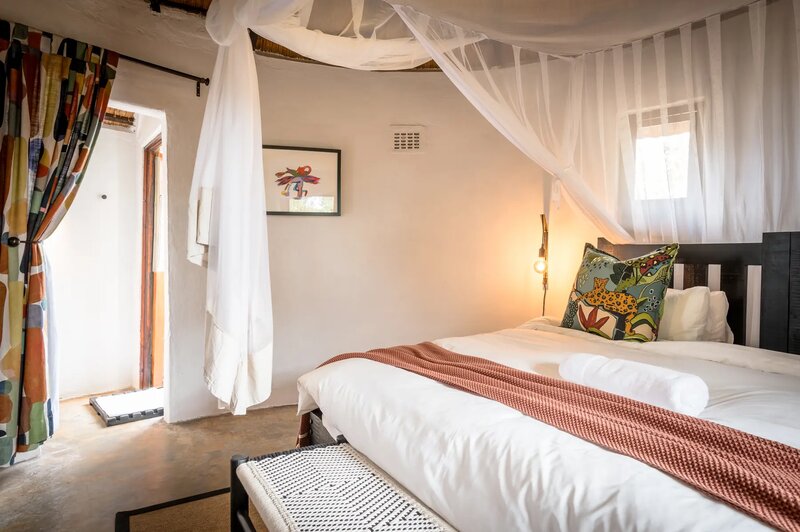 Africa on Foot chalet interior with rustic safari decor