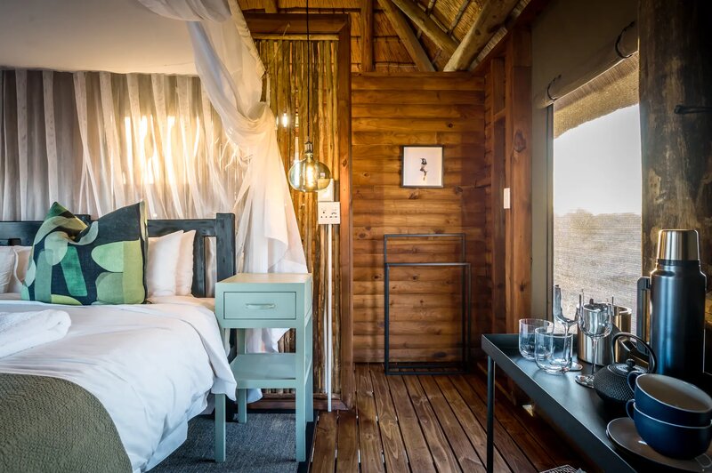 nThambo Tree Camp treehouse suite interior with rustic bushveld decor