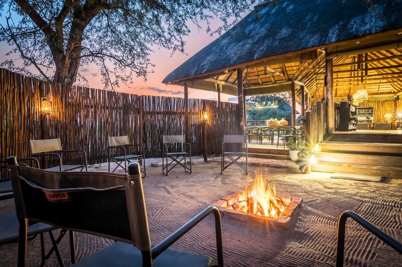 nThambo Tree Camp outdoor boma with fire pit under the stars