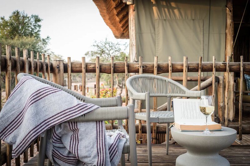 nThambo Tree Camp main lodge lounge and bar area