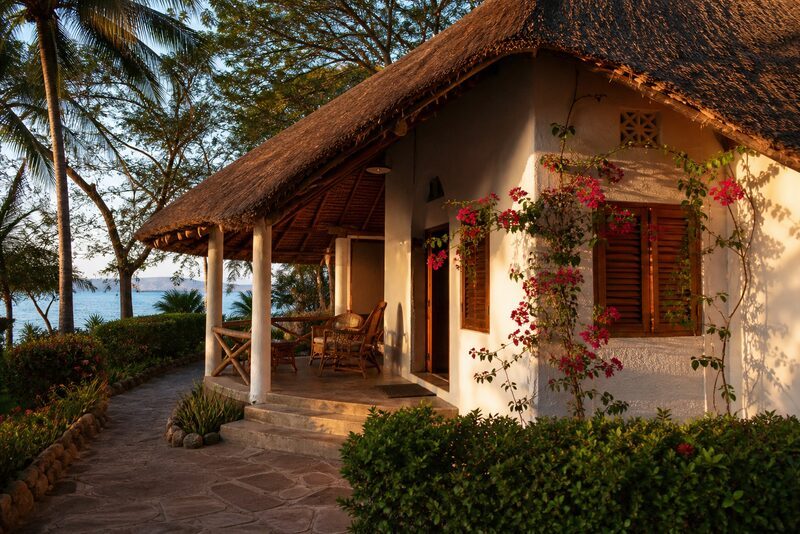 Thatched bungalow exterior at Tanganyika Blue Bay Resort