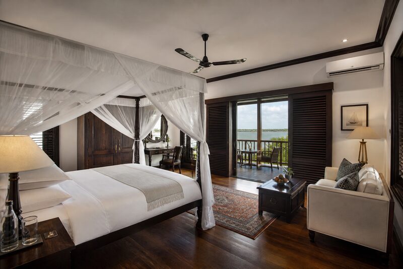 Superior suite bedroom with lake-view balcony