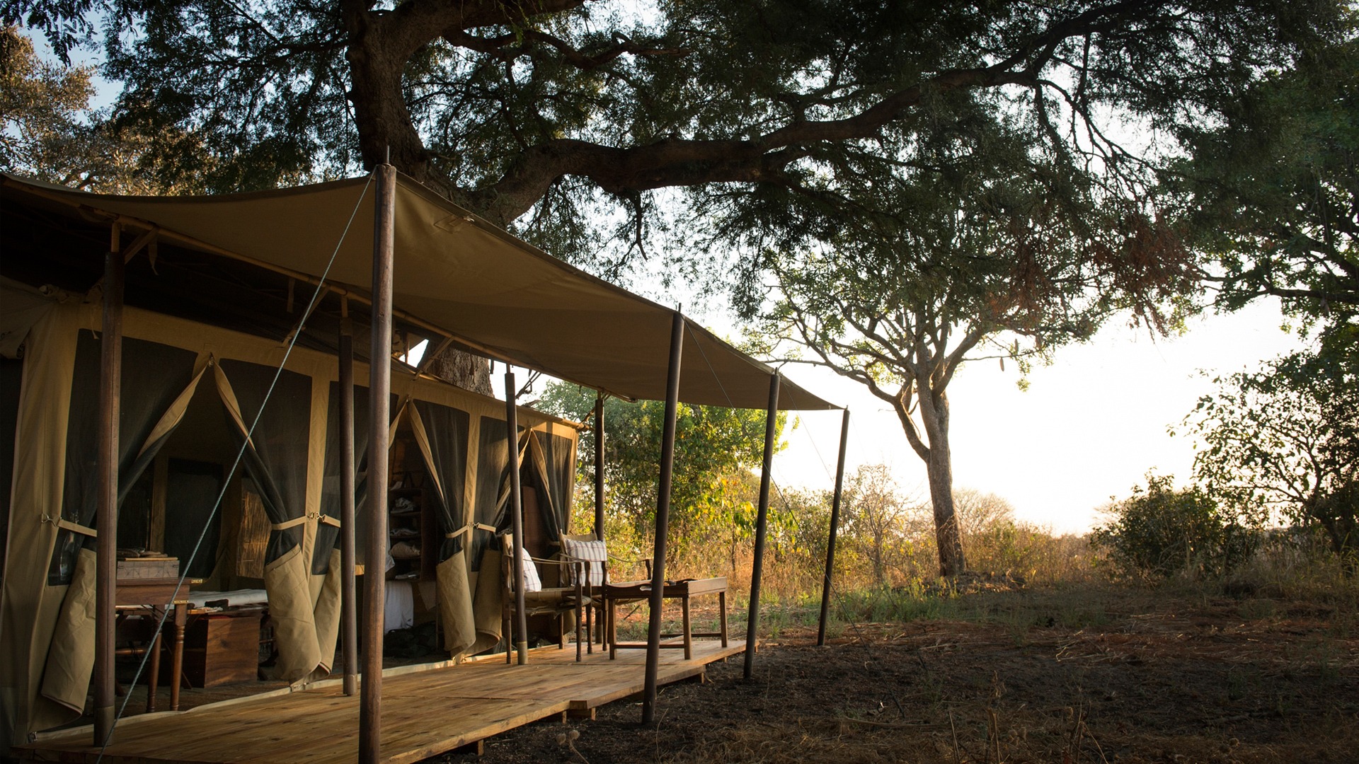 Classic Meru-style tented suite at Chada Katavi with wooden deck overlooking the Chada floodplain