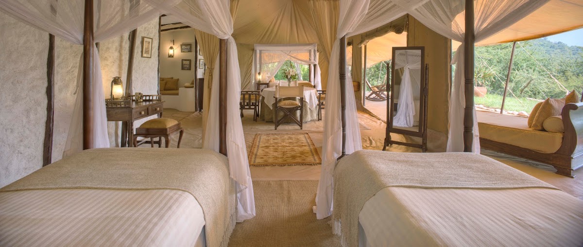 Period detail throughout — brass, leather and campaign furniture from a bygone era of safari.
