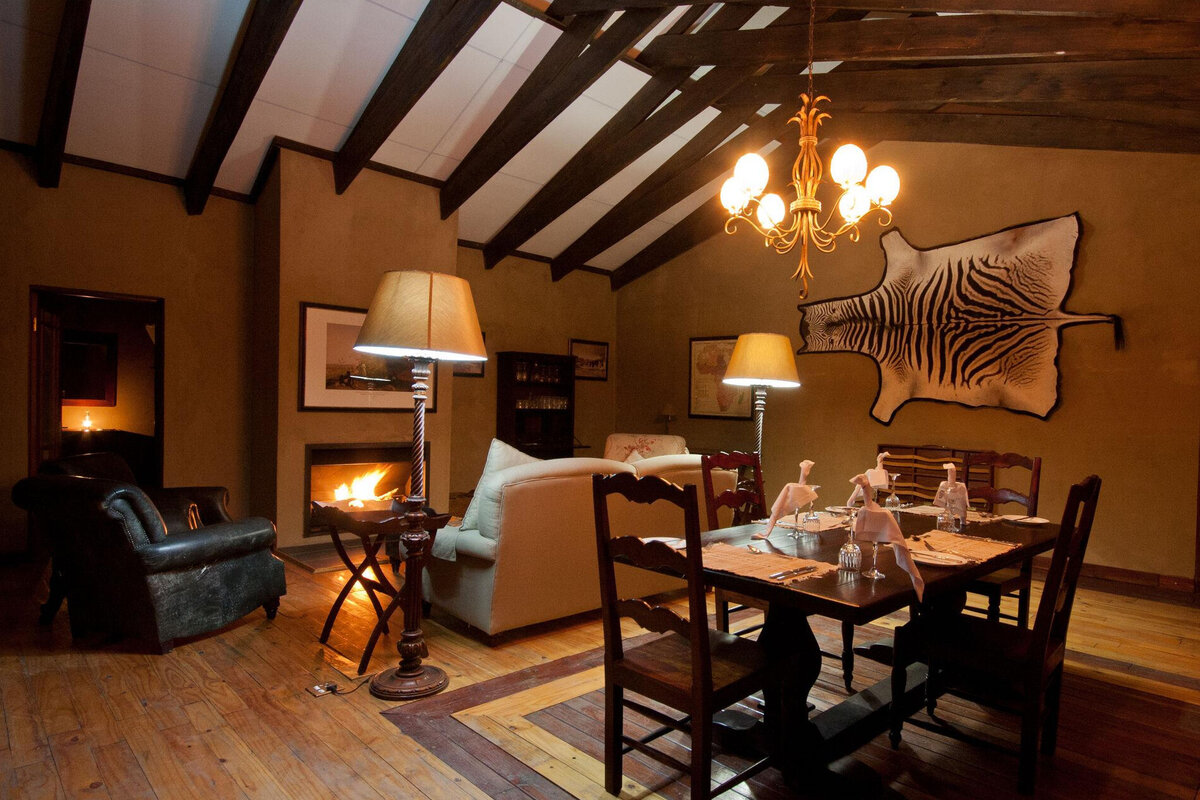Deception Valley Lodge manor-house lounge &mdash; classic Kalahari homestead style