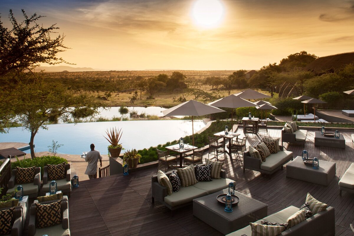 Four Seasons Safari Lodge Serengeti deck and pool overlooking the endless Serengeti plains
