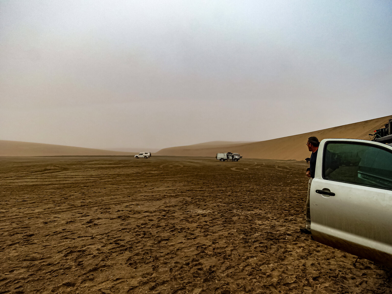 Coastal fog rolling across the desert plains of Iona National Park