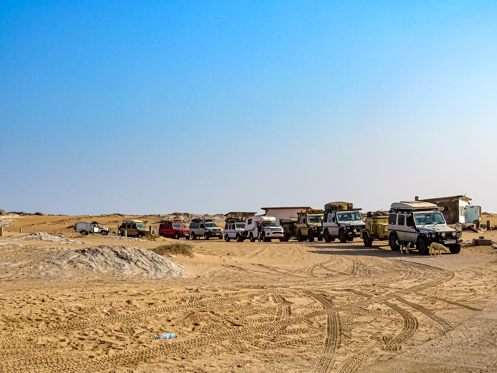 Expedition convoy camped on the sands of Iona National Park