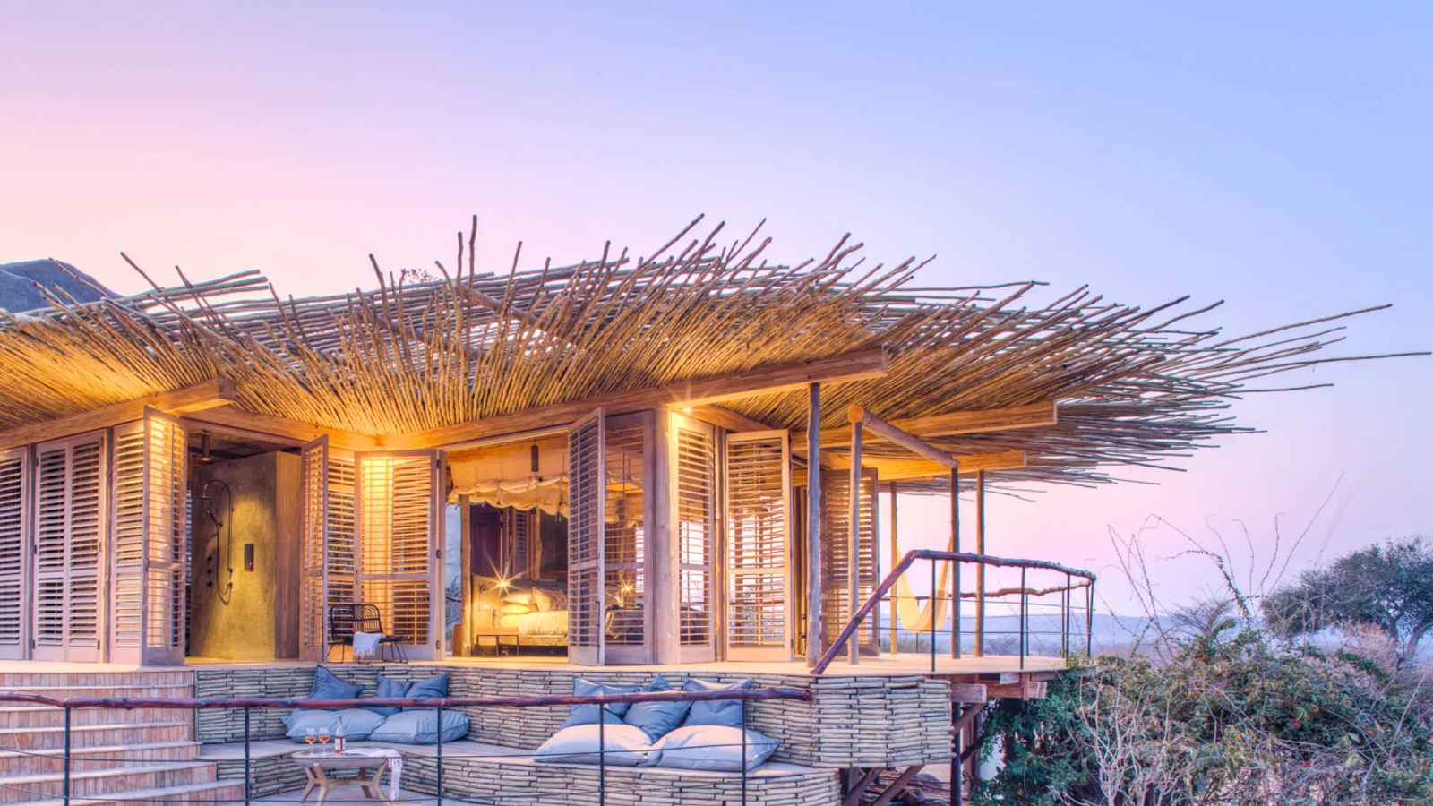 Jabali Ridge design-led lodge perched on a rocky kopje overlooking Ruaha baobab plains