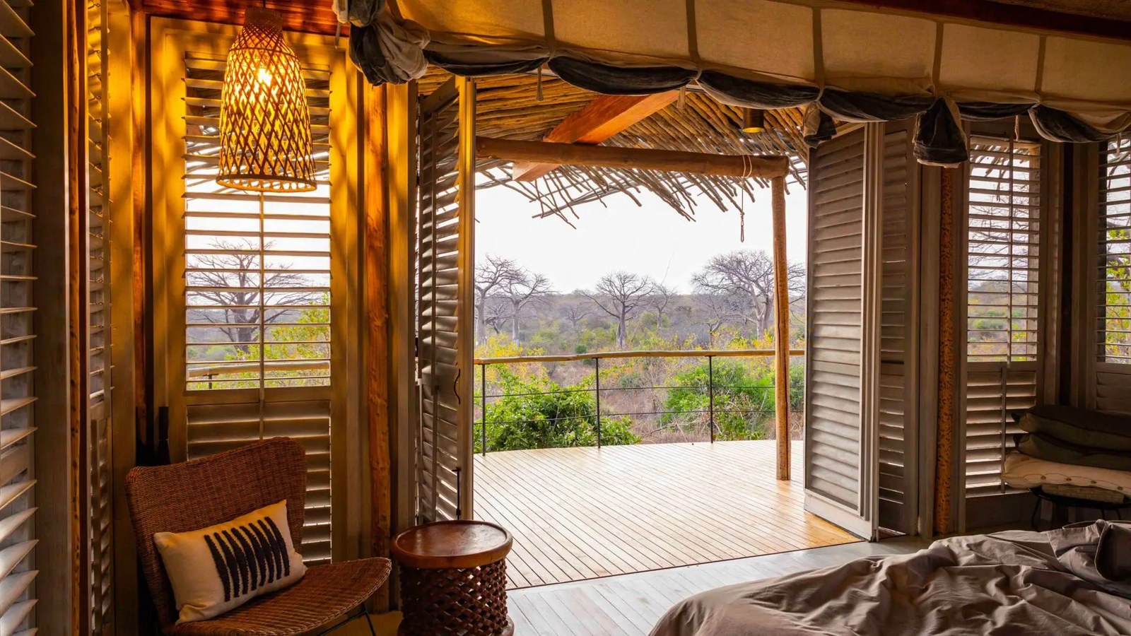 Jabali Ridge luxury suite with floor-to-ceiling windows and contemporary African design