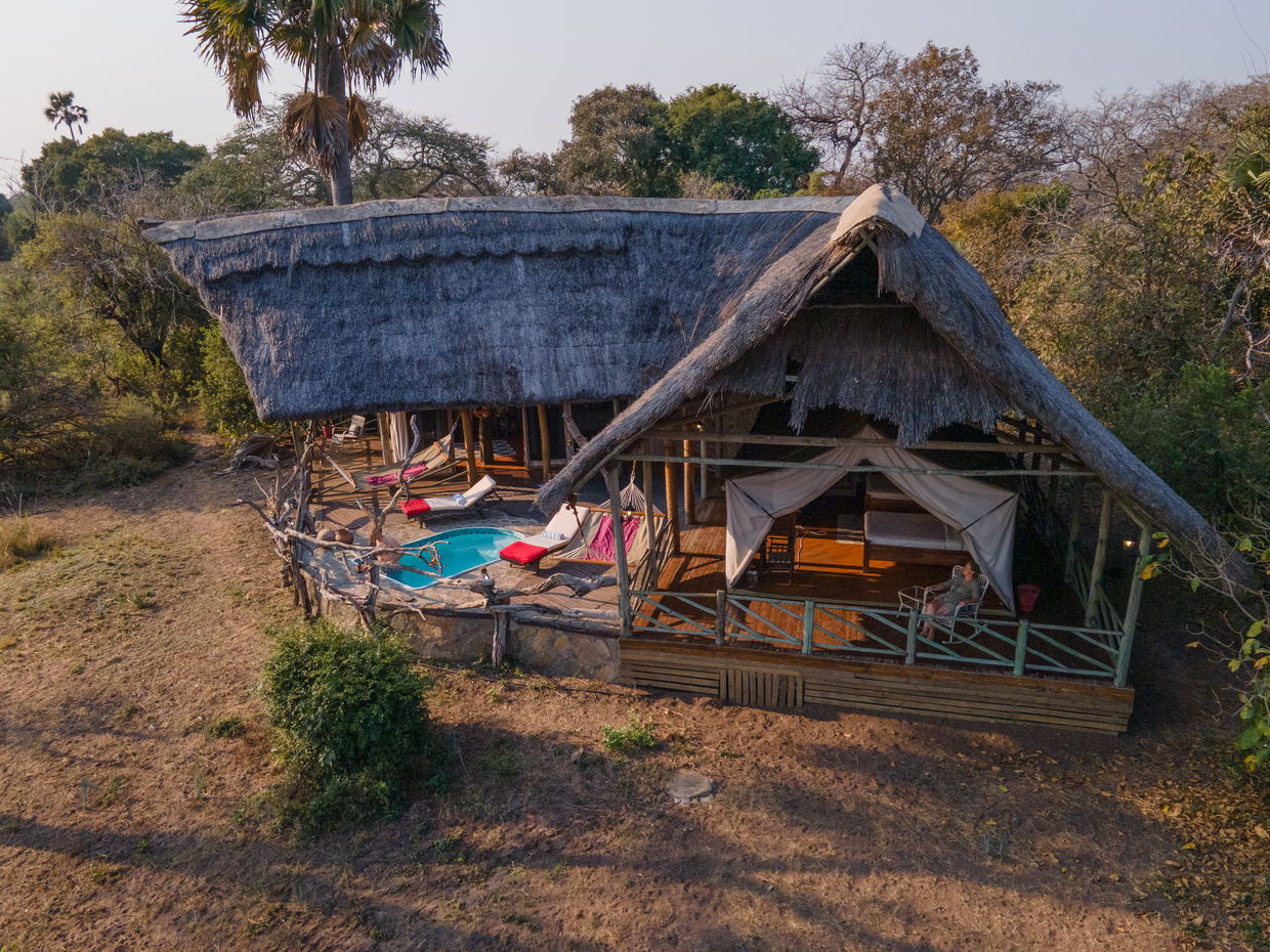 Katuma River view from Katavi Wildlife Camp with hippos and buffalo visible on the banks