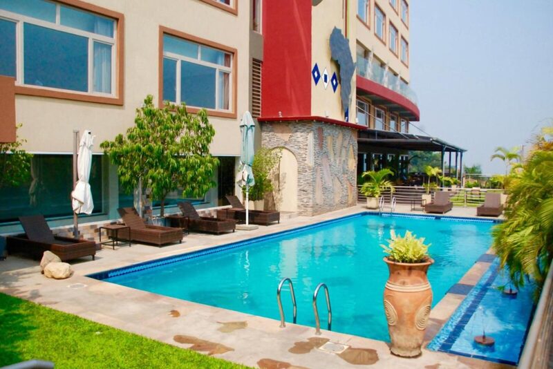 Pool area with tropical gardens at Kiriri Garden Hotel