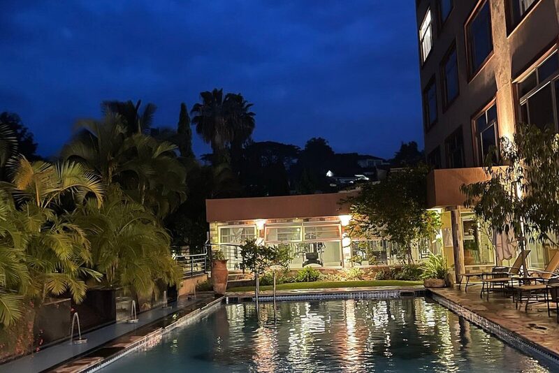 Poolside dining terrace at sunset