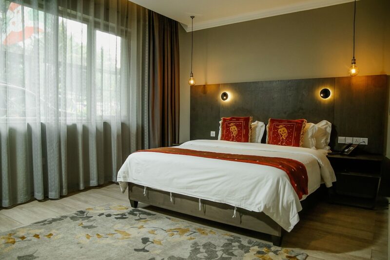 Standard room with modern furnishings at Kiriri Garden