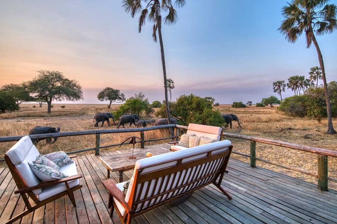 Spacious safari room at Mbali Mbali Katavi Lodge with indoor and outdoor shower