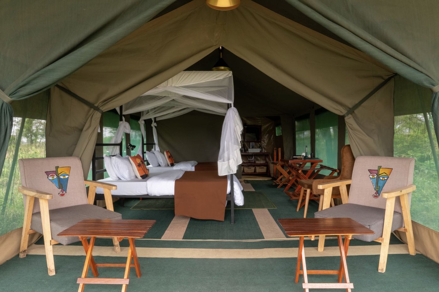 Mobile migration camp positioned near the wildebeest herds in the Serengeti