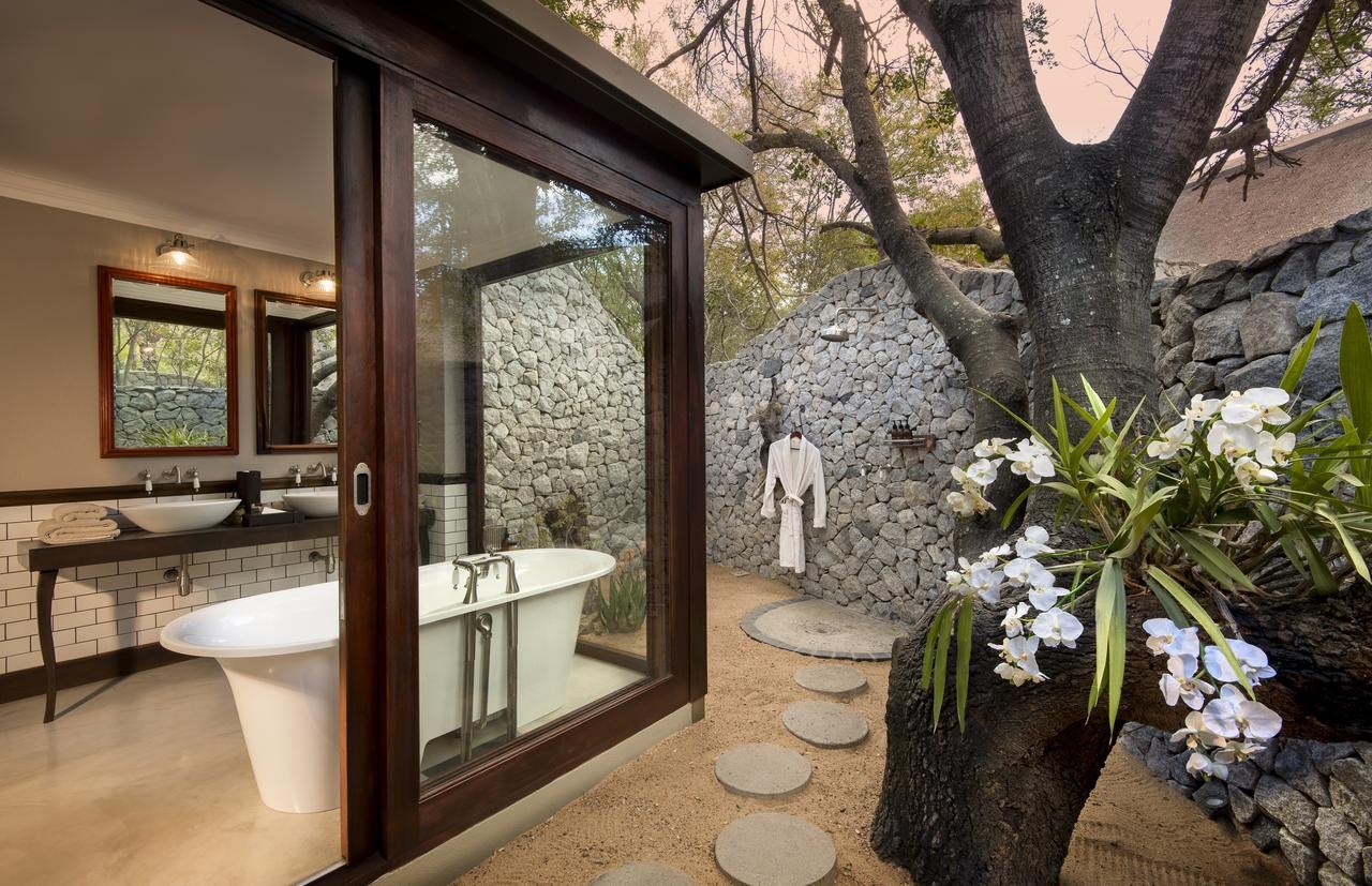Pool and lawn at Ngala Safari Lodge in the greater Kruger