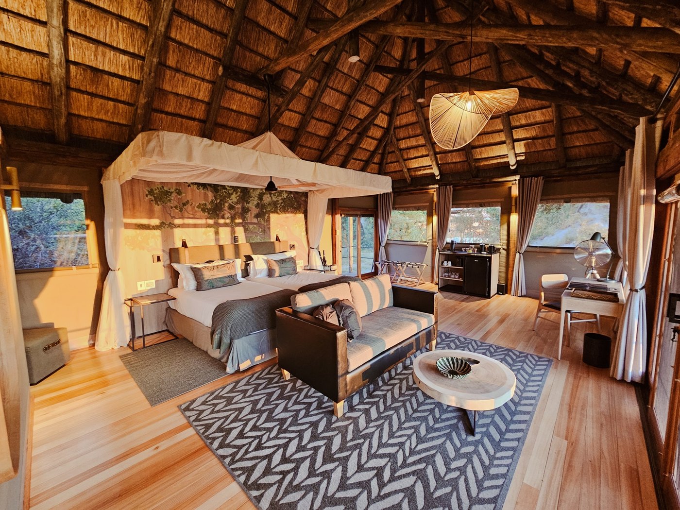 Interior of a luxury tented suite over an Okavango floodplain