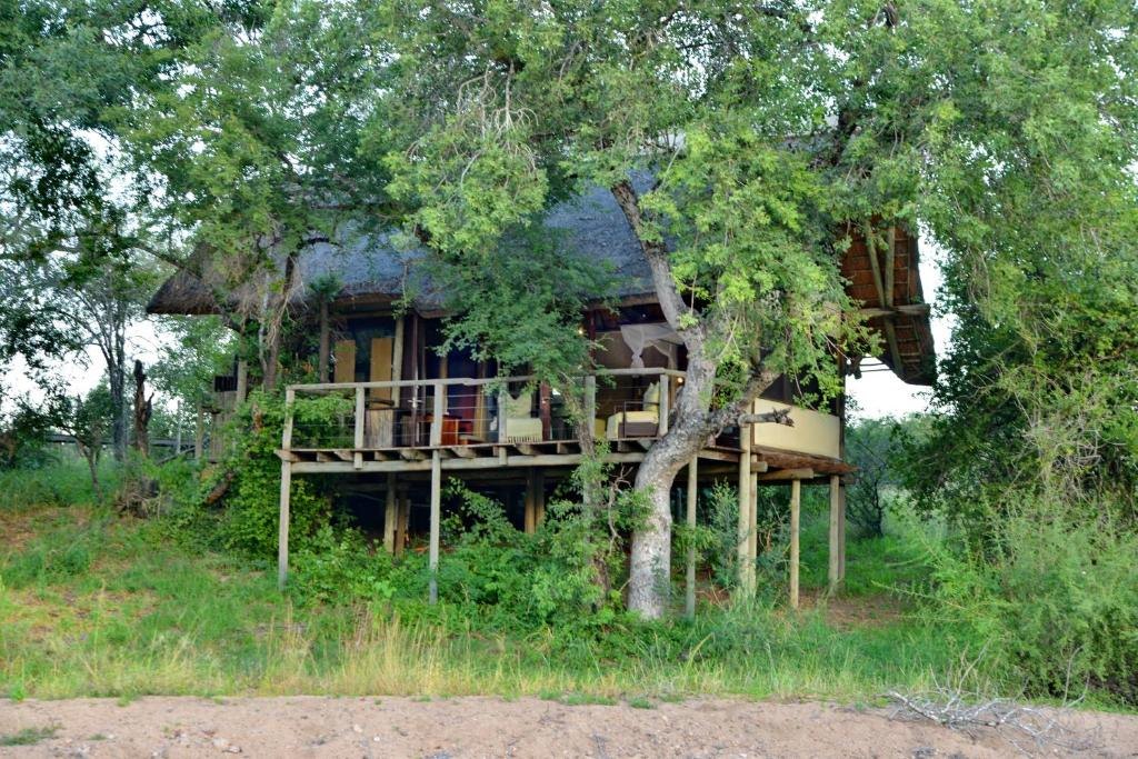 Rhino Post Safari Lodge rustic tented suite with river views, Klaserie