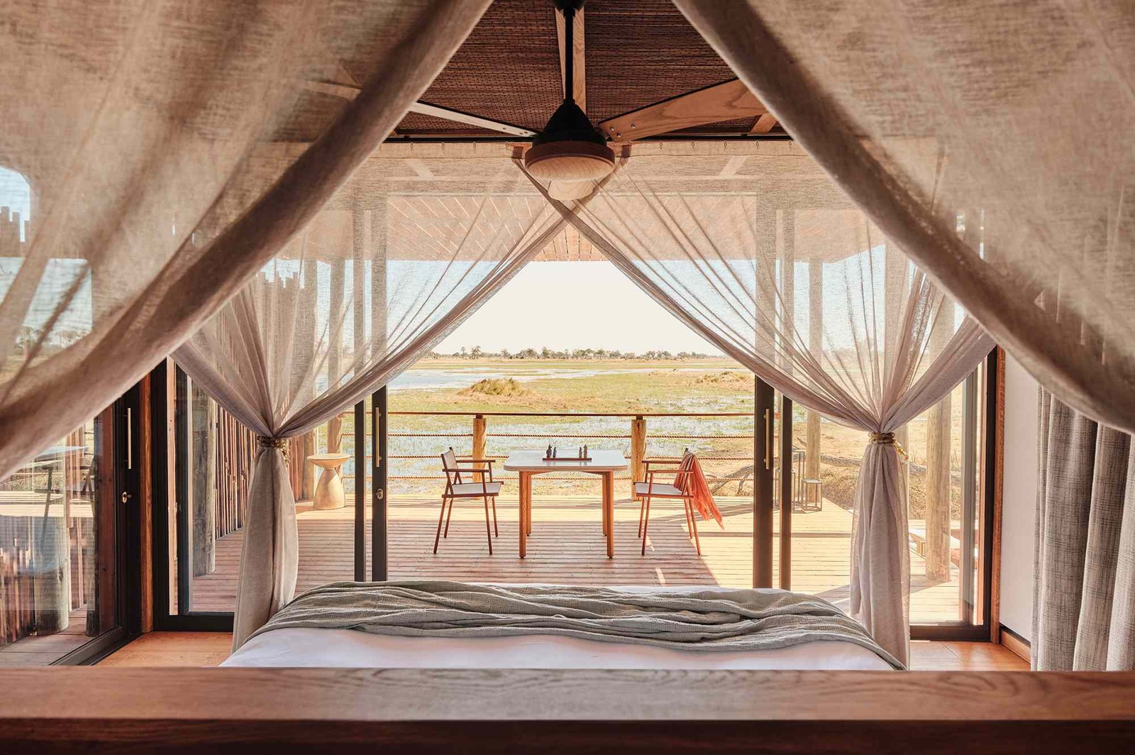 Sanctuary Baines' Camp open-fronted suite with bed facing the delta