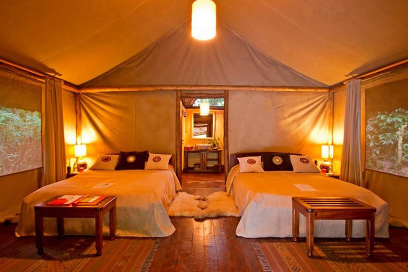 Sanctuary Gorilla Forest Camp — plunge pool and lounge area