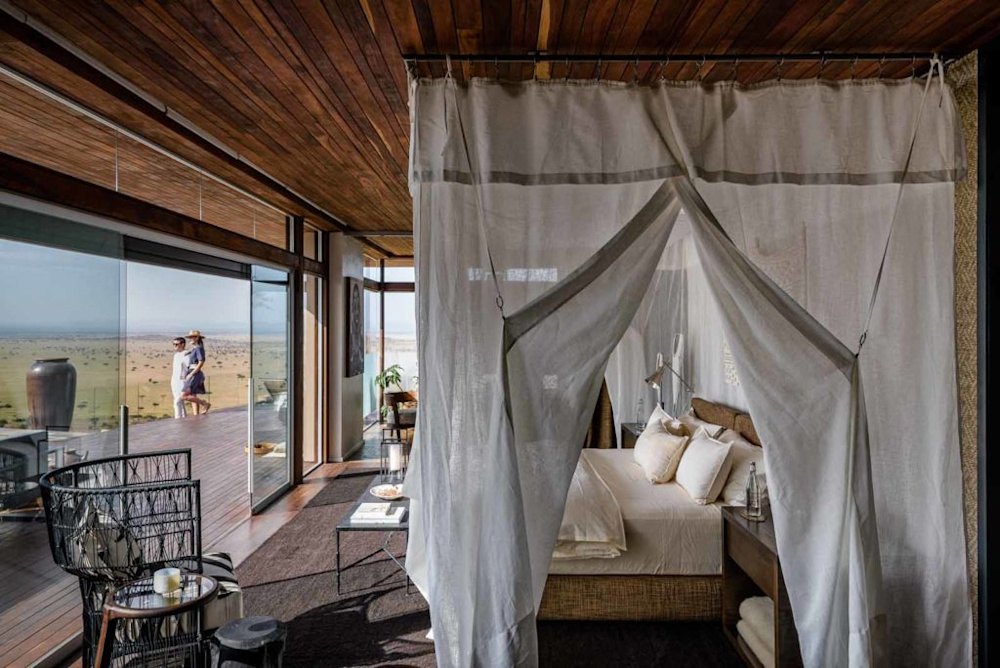 Manor-style luxury lodge overlooking the Serengeti plains in Tanzania — private safari tours