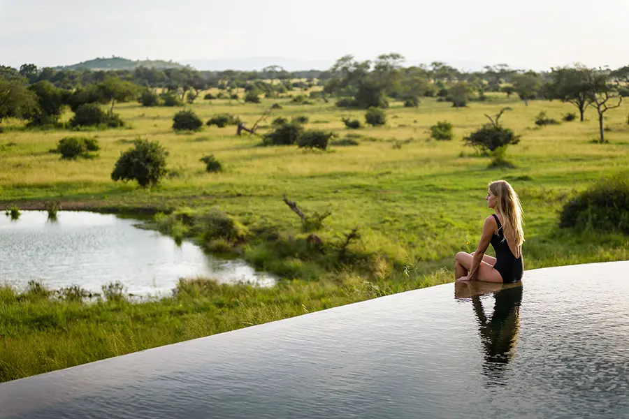 The infinity pool with river views at Singita Faru Faru Lodge, Grumeti, Serengeti