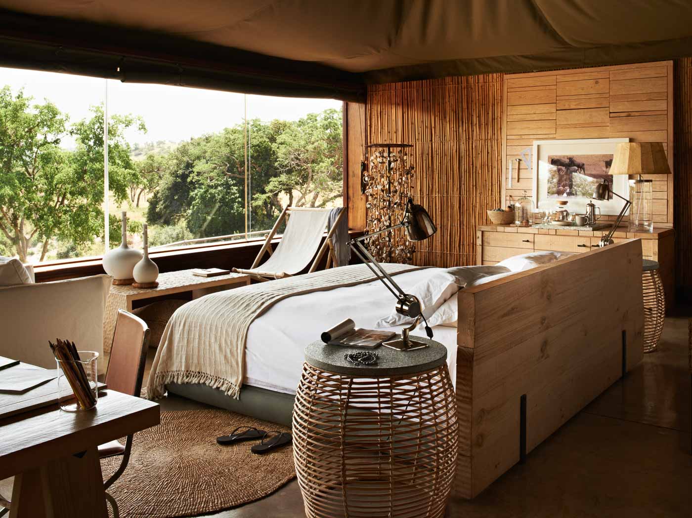 A game drive among elephants on the Grumeti concession at Singita Faru Faru, Serengeti